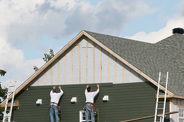 Professional Siding technician working in Manchester, PA